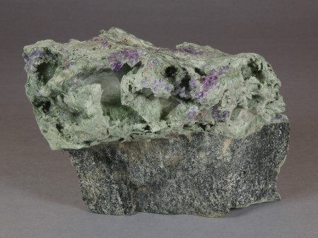 Pale green, fibrous actinolite and purple fluorite with white calcite 