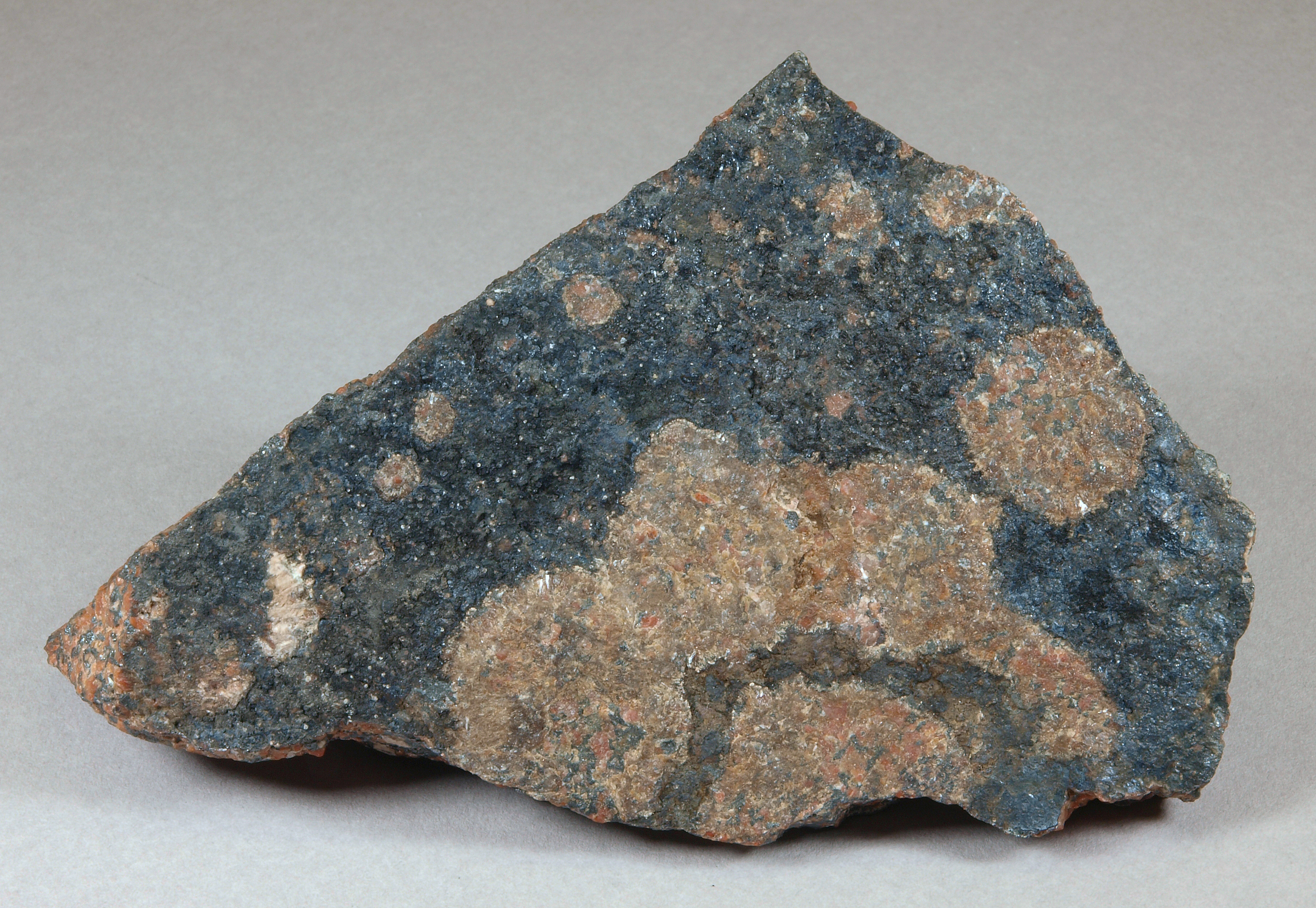 Splayed rosettes of akrochordite, granular, high-grade, brown willemite-franklinite ore, Sterling mine, Ogdensburg, NJ