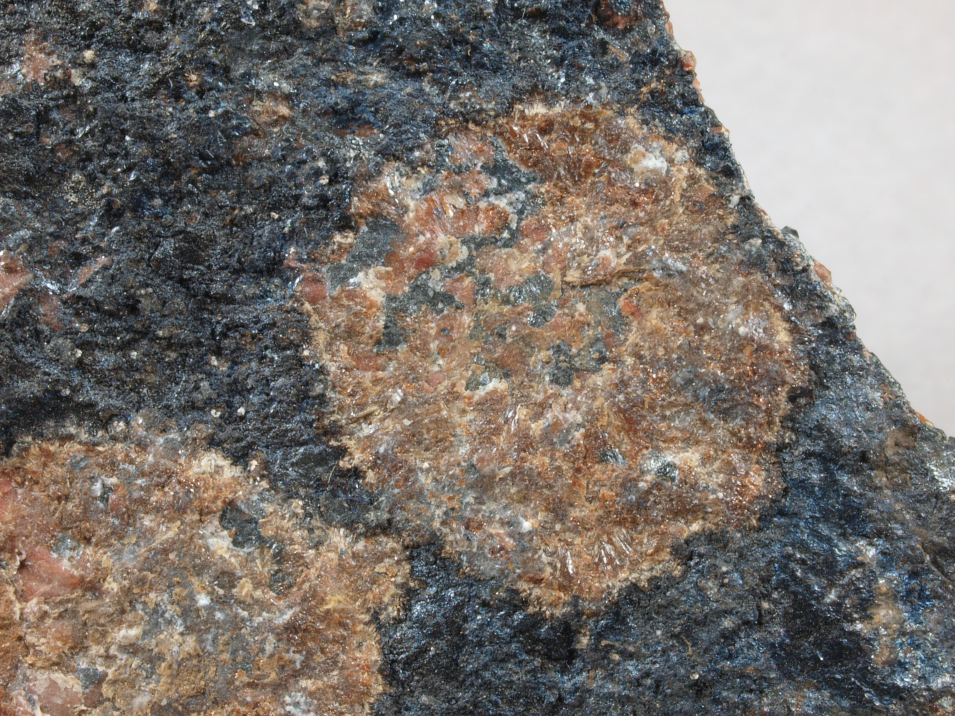 Splayed rosettes of akrochordite, granular, high-grade, brown willemite-franklinite ore, Sterling mine, Ogdensburg, NJ