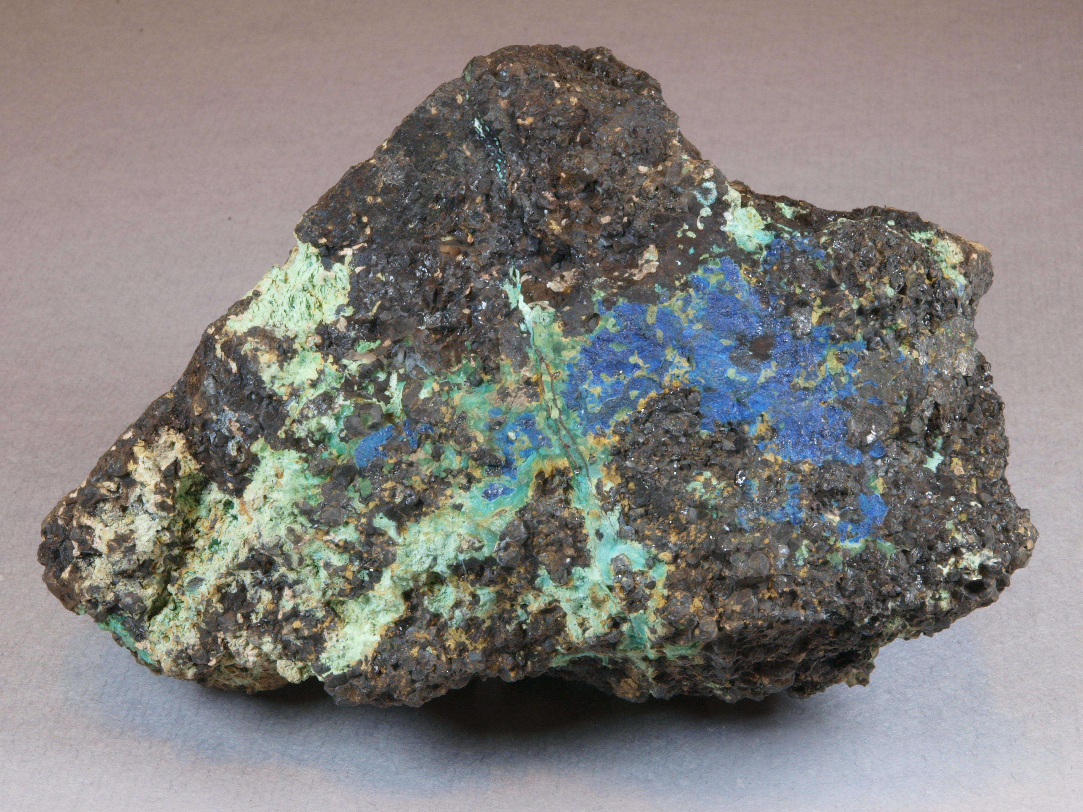 Deep blue azurite with chrysocolla and malachite, franklinite-rich ore