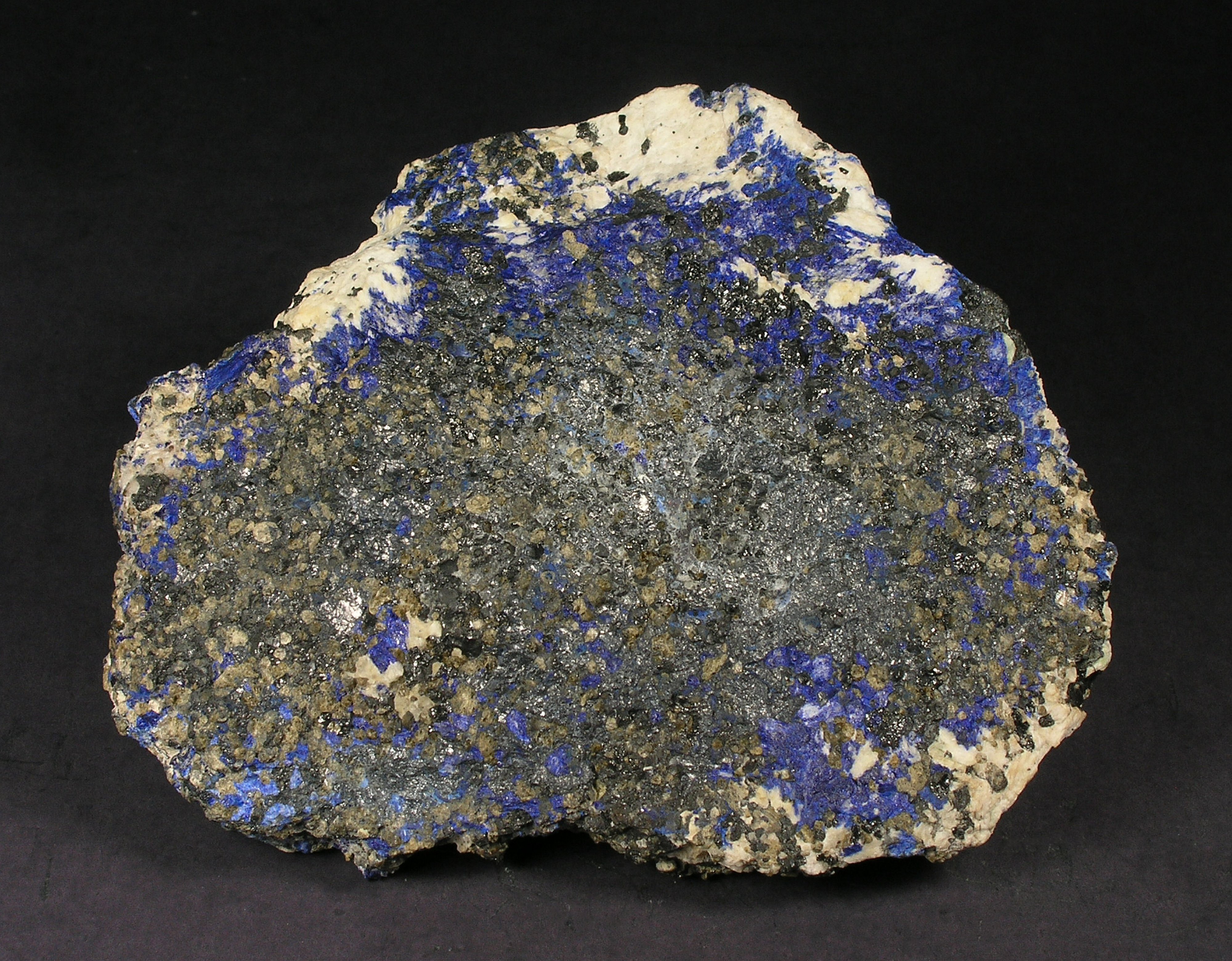 Blue azurite replacing calcite in franklinite-willemite-calcite ore