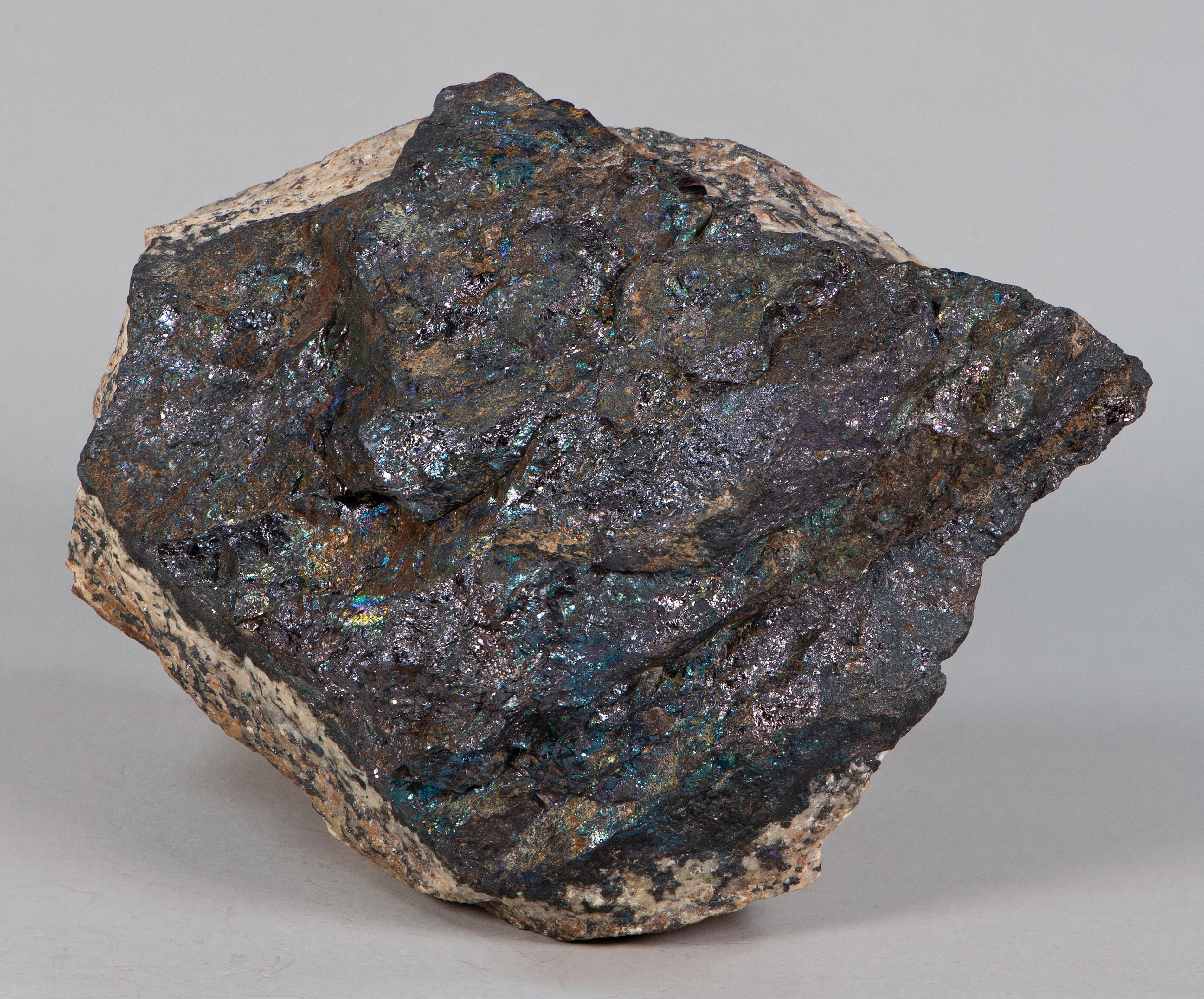 Massive, dark blue to violet bornite, golden-yellow chalcopyrite, franklinite-willemite-calcite ore, Franklin mine, Franklin NJ