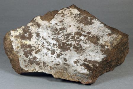 Coating of dypingite, franklinite-calcite ore, Sterling mine, Ogdensburg