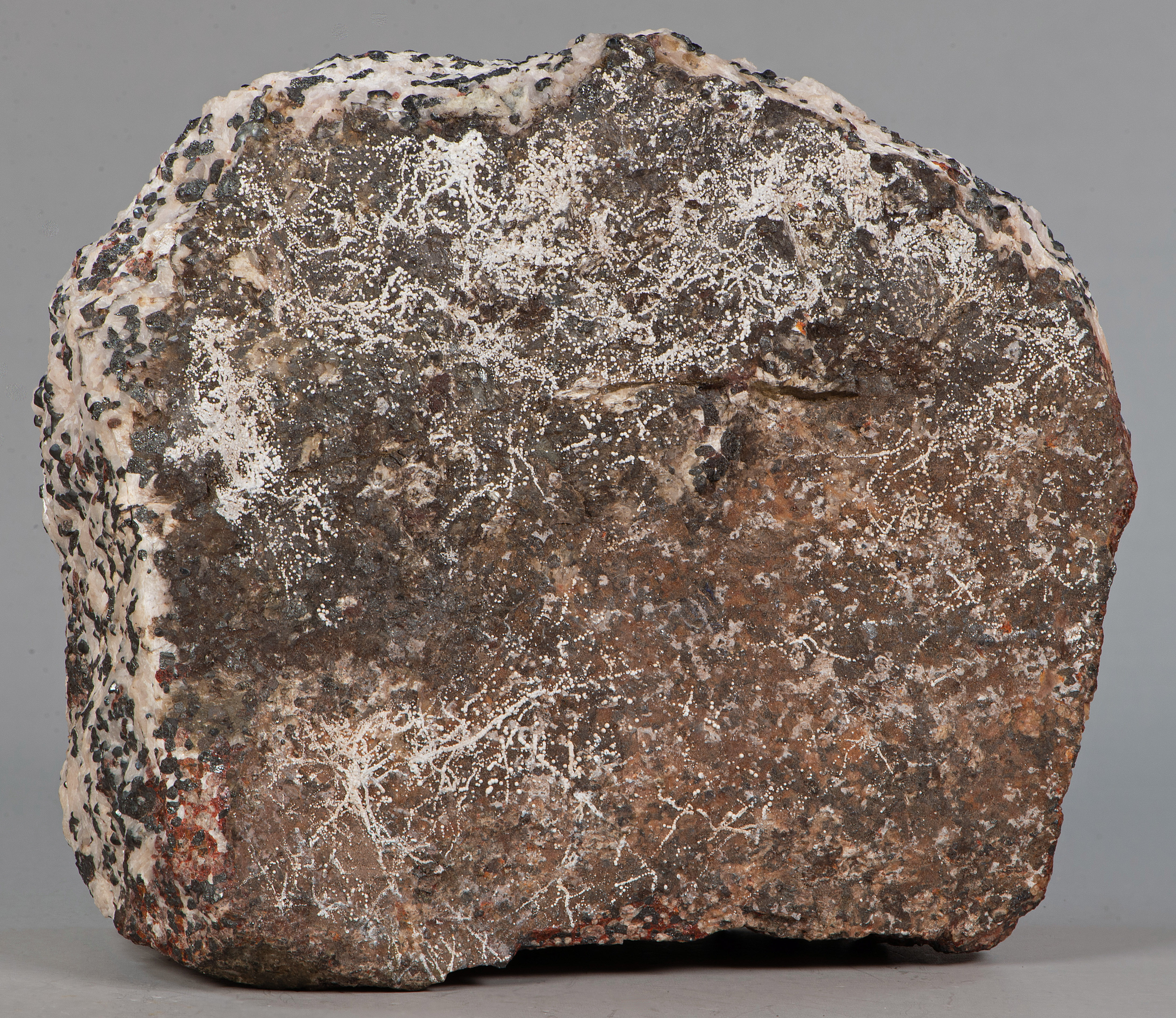 Dypingite hemispherules, franklinite-willemite-zincite-calcite ore, Sterling mine, Ogdensburg