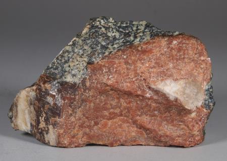 SCH10, brown to reddish-brown, type I schallerite, minor white calcite, gneissic willemite-franklinite ore from Franklin mine, Franklin NJ