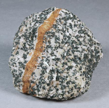 SCH9, fine-grained brown schallerite in granular franklinite-calcite ore, Franklin mine, Franklin NJ
