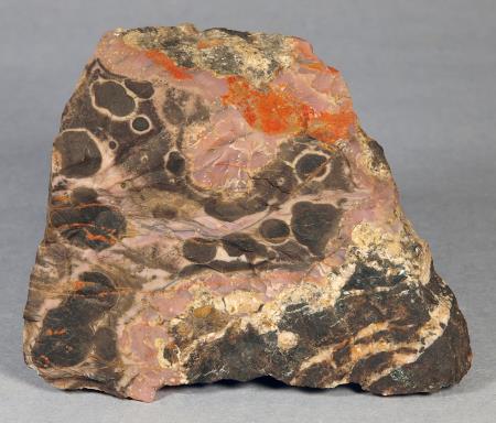Bird’s-eye sussexite with pyrochroite and zincite, calcite, Sterling mine, Ogdensburg