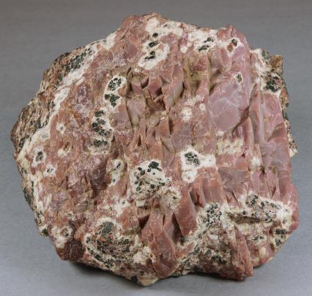 Richly colored sussexite mass in lean calcite-franklinite-willemite ore, Sterling mine, Ogdensburg