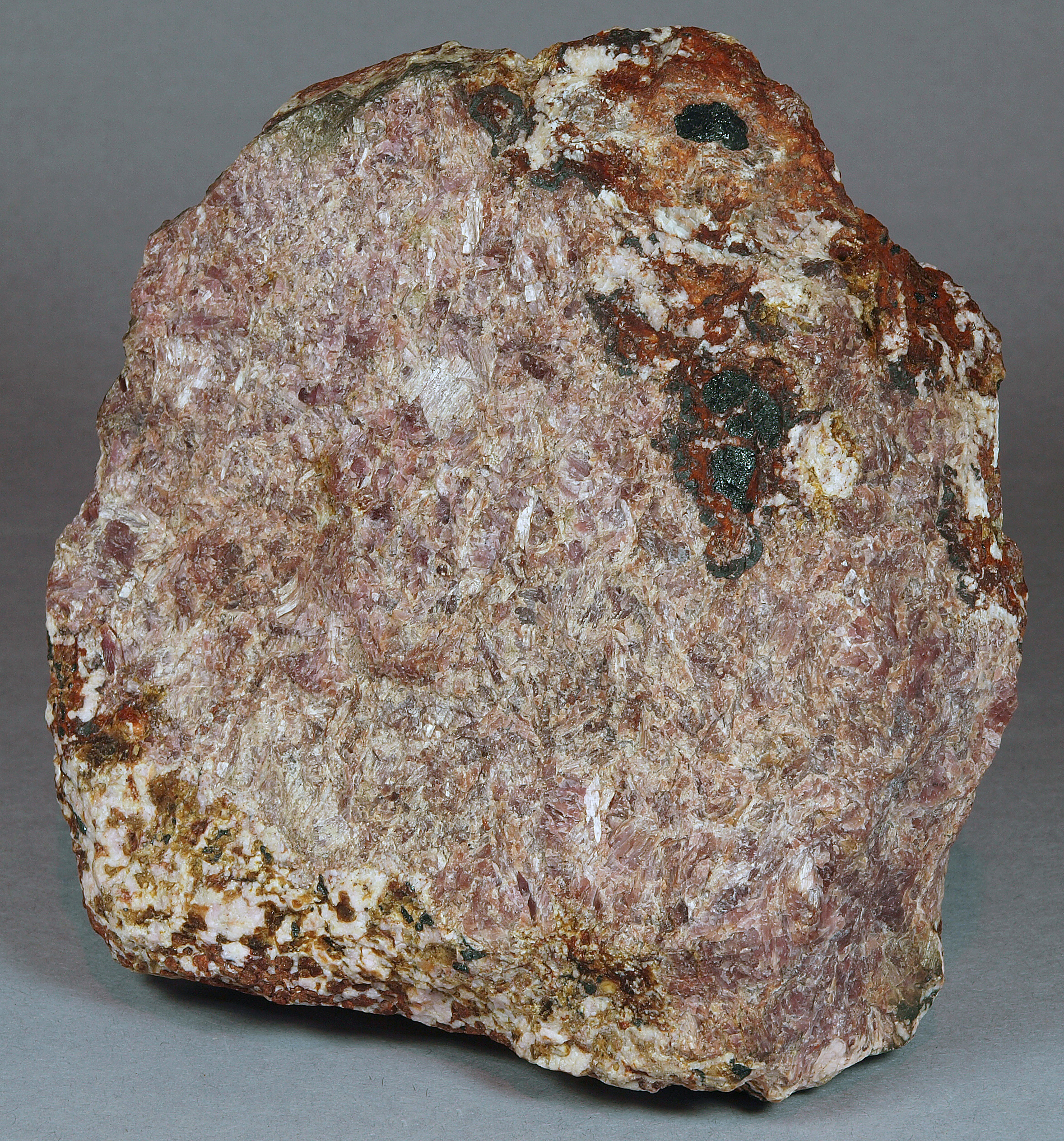 Pinkish-lavender-to-purple sussexite, franklinite-willemite-calcite ore, serpentine, hematite, Sterling mine, Ogdensburg