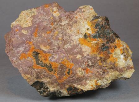Pinkish-lavender cherty sussexite, calcite. zincite, franklinite-willemite ore, pyrochroite, Sterling mine, Ogdensburg