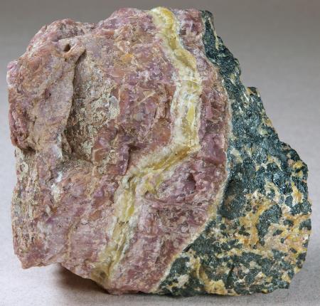 Pinkish-lavender sussexite, granular franklinite-willemite ore, Franklin mine, Franklin