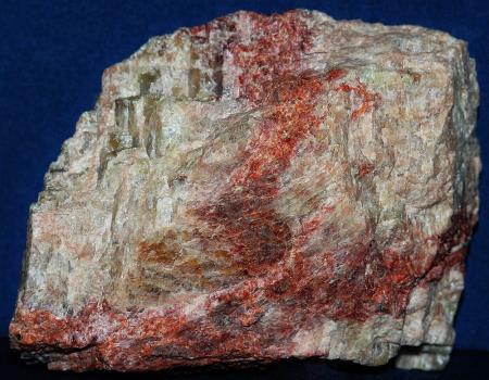 Clear to beige to red willemite, gemmy in areas
