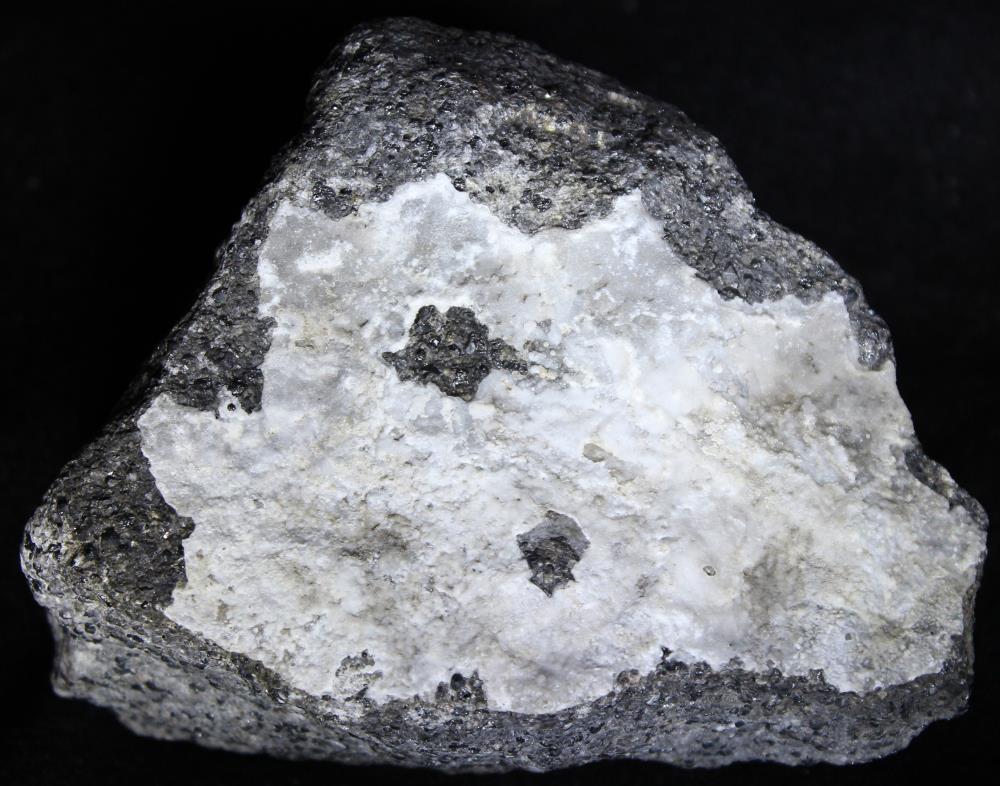 Aragonite coating on calcite / willemite /  franklinite ore, Buckwheat Dump Franklin
