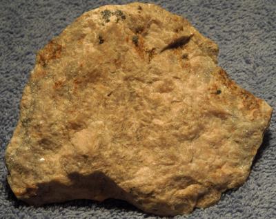 Axinite-(Mn), margarosanite, willemite, andradite, franklinite, from Franklin