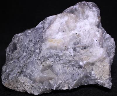 Calcite (mid-wave) and minor franklinite, from the Buckwheat Dump, Franklin NJ. Photo by WP.