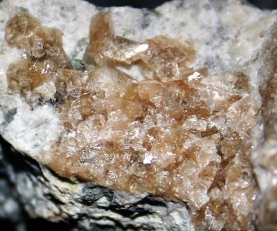 Chabazite crystals (gemmy tan) on Sterling Hill ore.