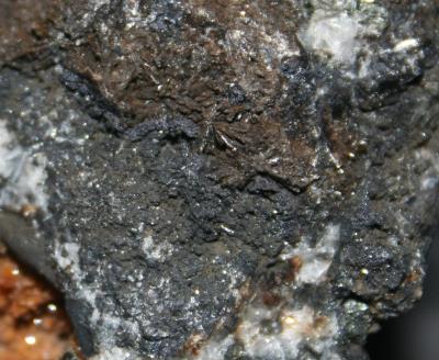 Chalcophanite on weathered ore from the mud zone, Sterling Hill Mine, NJ.