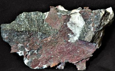 Copper, willemite, franklinite and minor calcite from Franklin, NJ.