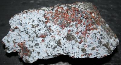 Hydrozincite coating, willemite, calcite, franklinite and zincite ore from Sterling Hill Mine
