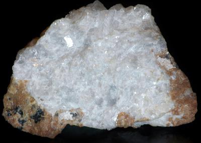 Platy margarosanite on hancockite with minor willemite, franklinite, roeblingite and clinohedrite, from Franklin, NJ.