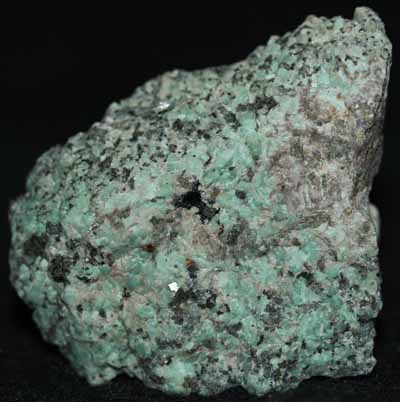 Microcline var amazonite, calcite, and willemite from Franklin, NJ