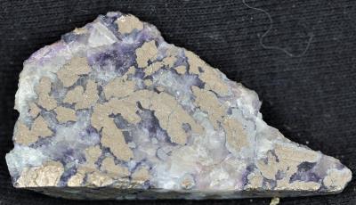 Sawn nickeline, fluorite, calcite and minor rammelsbergite from Franklin, NJ