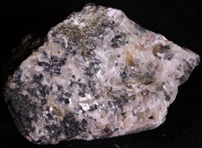 Powellite, calcite, franklinite and minor quartz from the Sterling Hill Mine, NJ.