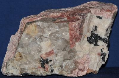 Quartz, rhodonite, calcite, willemite and minor franklinite from Franklin, NJ