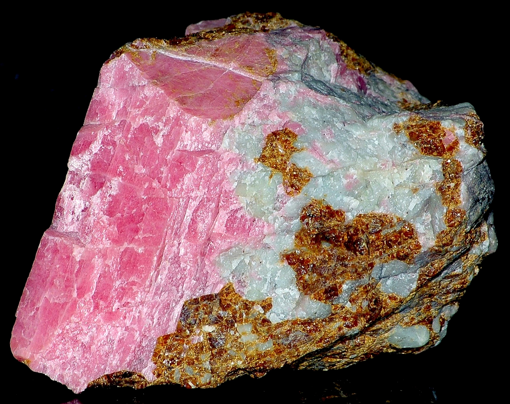 Rhodonite, willemite and andradite garnet from Franklin, NJ