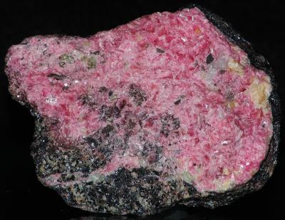 Bladed rhodonite, franklinite, willemite with minor calcite and hedyphane from Franklin, NJ