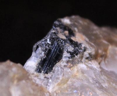 Schorl in quartz from the Sterling Hill Mine, NJ.