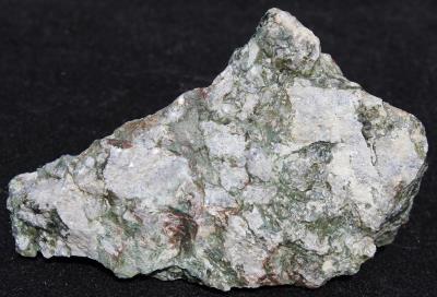 Stilpnomelane, dolomite, calcite, and minor sphalerite, Taylor Road Dump, Franklin, NJ.