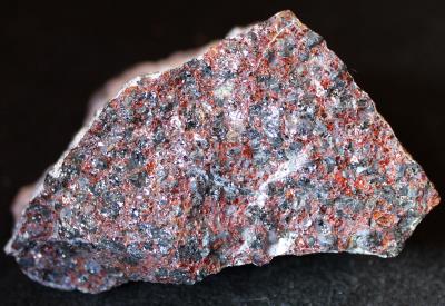 Zincite with franklinite and minor calcite, Sterling Hill NJ