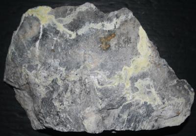 Znucalite coating on calcite from Sterling Hill Mine North ore body, Ogdensburg, NJ